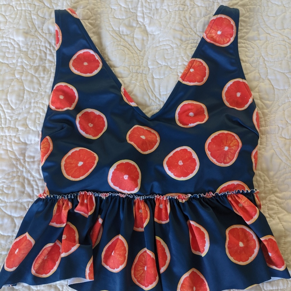 Kortni Jeane peplum style swim top
